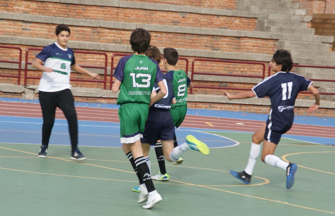 Las mejores imágenes del partido de fútbol sala cadete masculino entre San Patricio Soto Azul y Maristas Chamberí