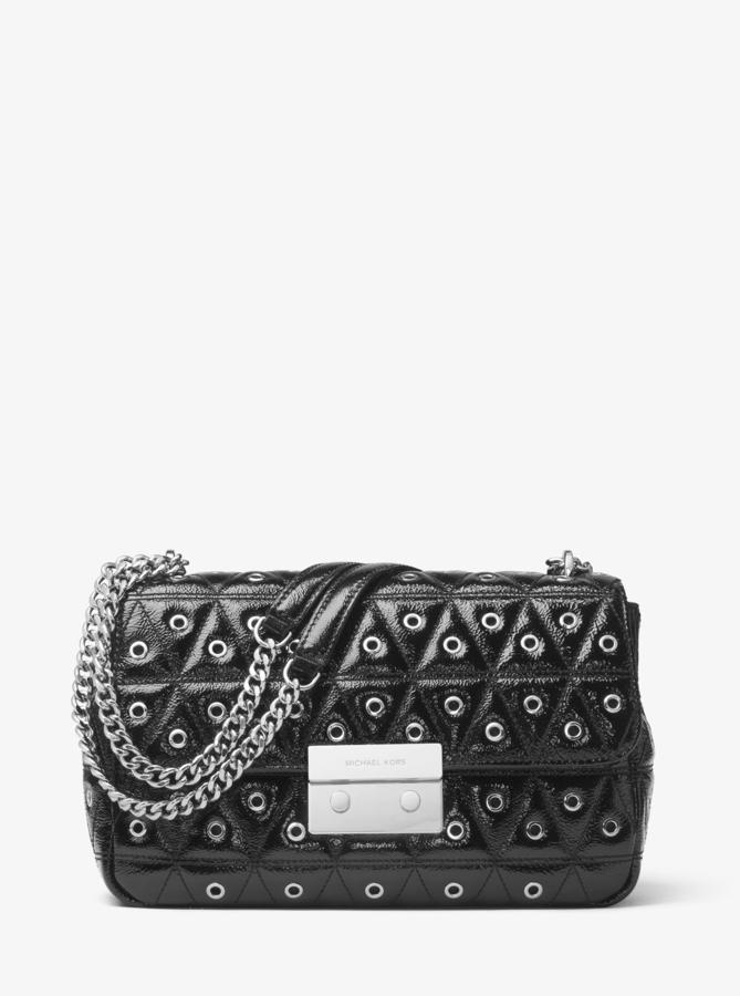 Michael Kors. Bolso de hombro Sloan de piel con ojales. (Precio: De 395 a 197 euros)