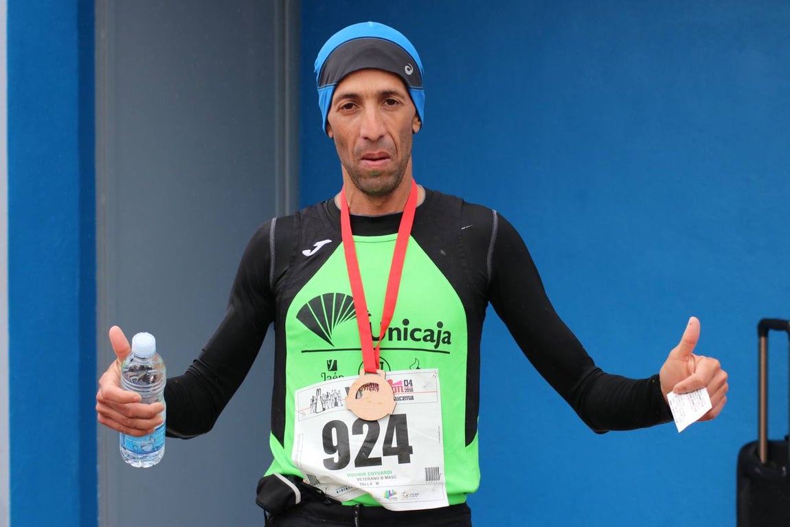 La lluviosa Media Maratón de Lucena, en imágenes