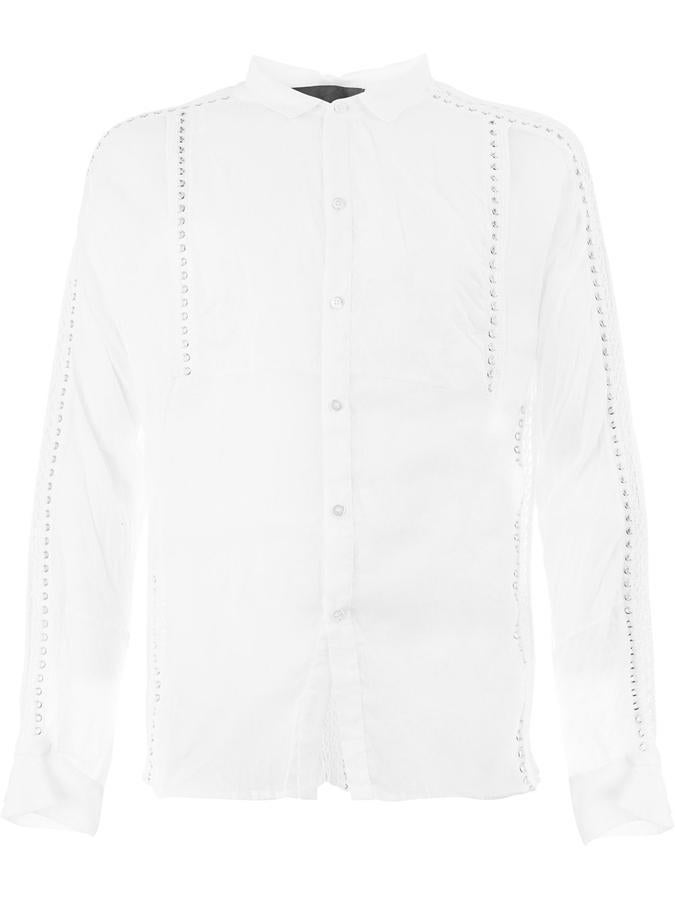 Camisa de Di Liborio. ¿Buscas algo completamente diferente? Sorprende con esta camisa blanca con botones en algodón de la firma Di Liborio (Precio: 1681 euros).