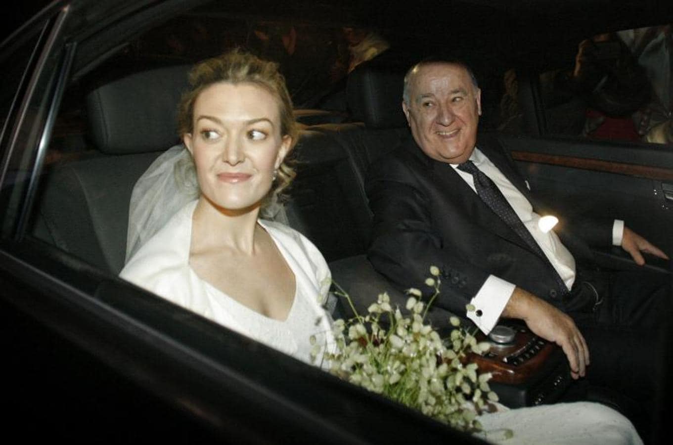 El fundador de Zara junto a su hija, Marta Ortega, el día de su boda. 