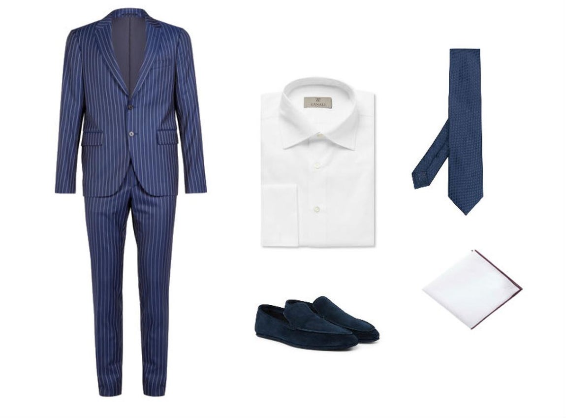 Look con traje de raya diplomática para la cena de empresa. Dado que no suele ser un evento demasiado formal, puedes permitirte el lujo de lucir un traje de raya diplomática como este de Versace (Precio: 1.640euros). Llévalo con camisa blanca de Canali (Precio: 240 euros), mocasines de ante en color azul firmados por Loro Piana (Precio: 690 euros) y corbata de Brioni (Precio: 170 euros).