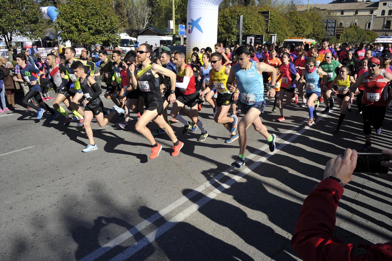 La sexta carrera solidaria «Mujeres y Hombres por la Igualdad» de Toledo, en imágenes