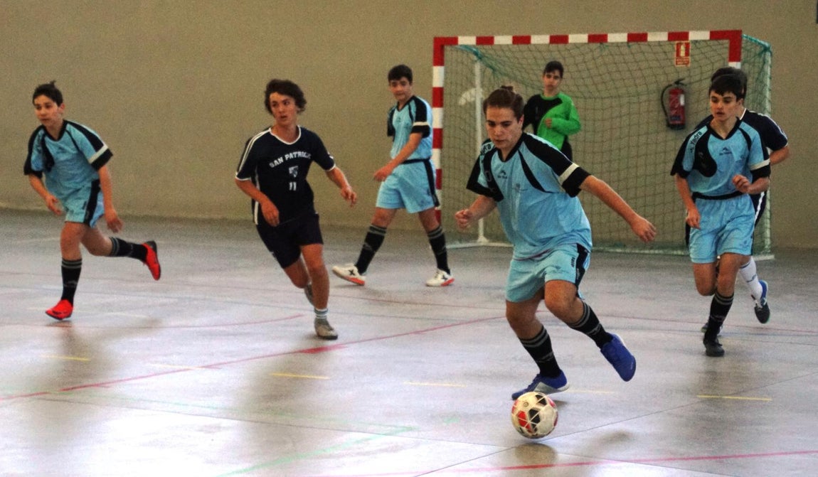 Las mejores imágenes del encuentro de fútsal entre el Fray Luis León A y el San Patricio Soto A. 