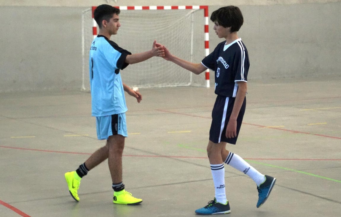 Las mejores imágenes del encuentro de fútsal entre el Fray Luis León A y el San Patricio Soto A. 
