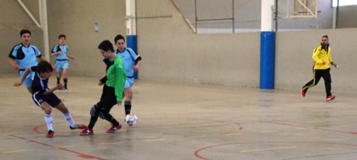 Las mejores imágenes del encuentro de fútsal entre el Fray Luis León A y el San Patricio Soto A. 