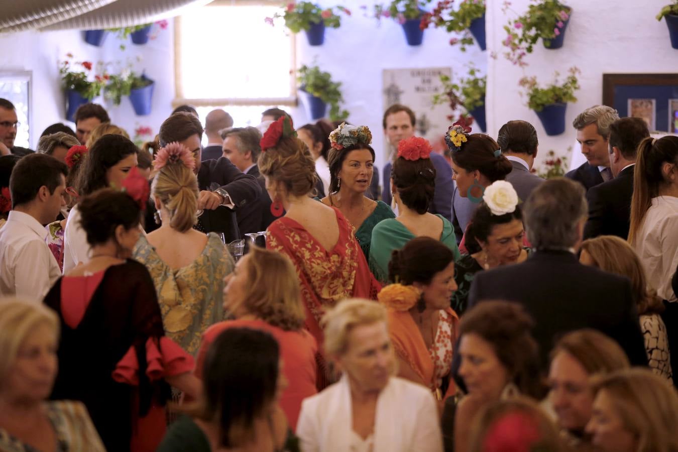 El ambiente de las casetas en el lunes de la Feria de Córdoba, en imágenes