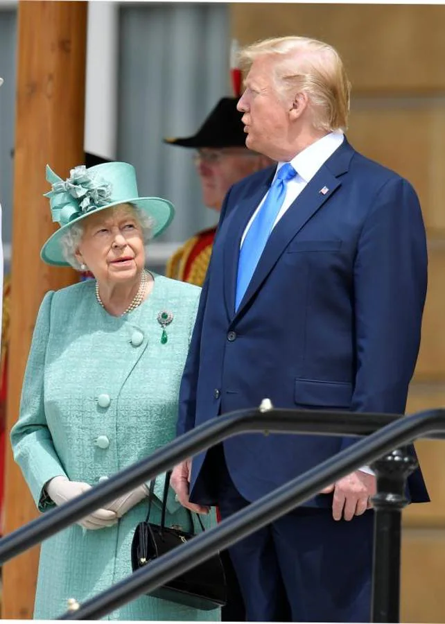 Este lunes ha tenido lugar un banquete de Estado en Buckingham Palace, donde Isabel II ha podido gozar nuevamente de la compañía de Donald Trump.. 