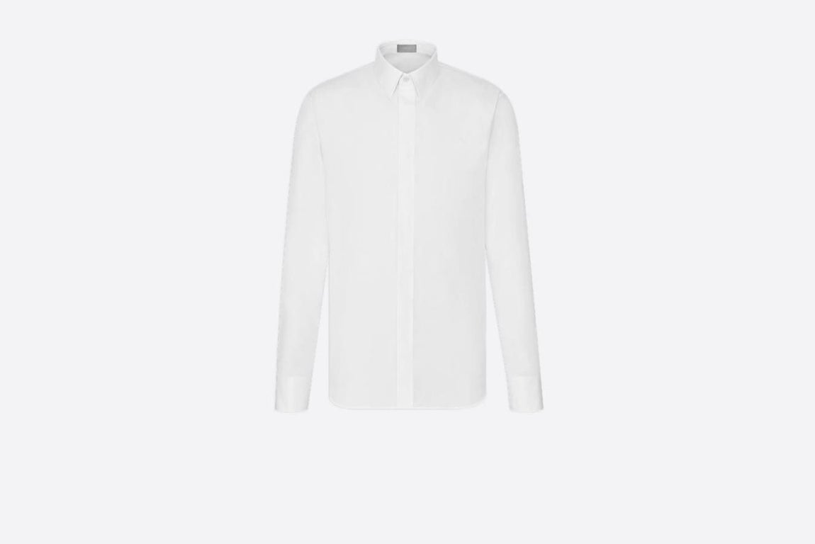 David Beckham lo combinó con una camisa de algodón blanca con puño francés (precio: 490€).
