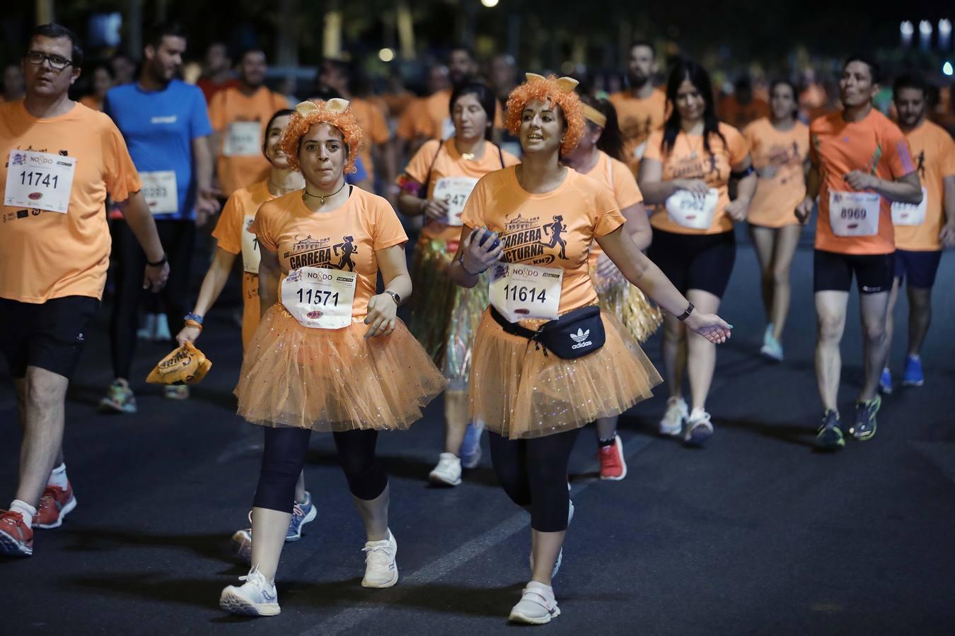 ¿Has corrido la Carrera Nocturna de Sevilla? Búscate en las fotos (III)