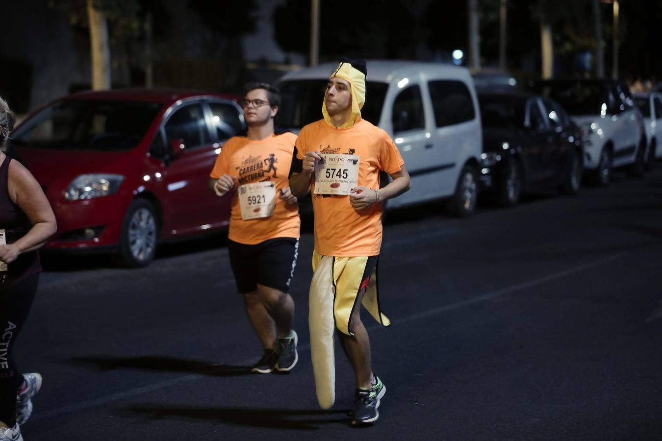 ¿Has corrido la Carrera Nocturna de Sevilla? Búscate en las fotos (III)