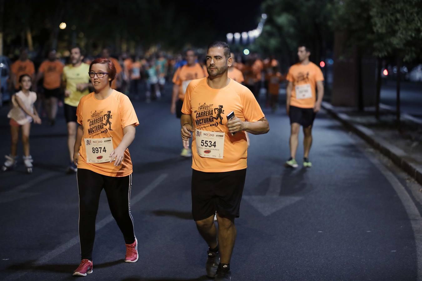 ¿Has corrido la Carrera Nocturna de Sevilla? Búscate en las fotos (III)