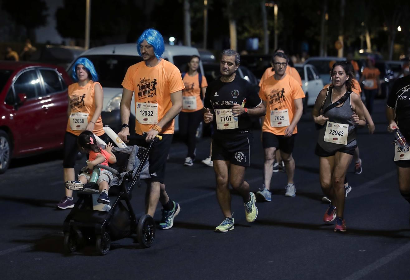 ¿Has corrido la Carrera Nocturna de Sevilla? Búscate en las fotos (III)