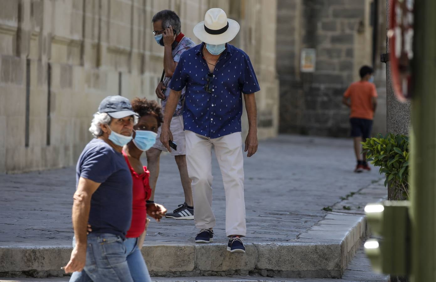 En imágenes, el calor marca la llegada de la «nueva normalidad» en Sevilla