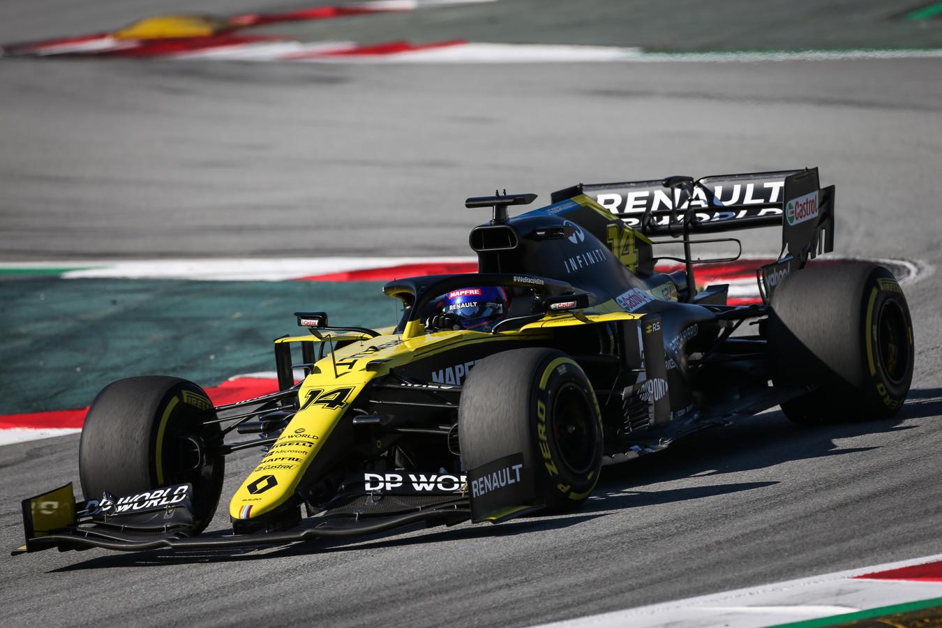 Todas las fotos del estreno de Fernando Alonso con el Renault RS20 en Montmeló