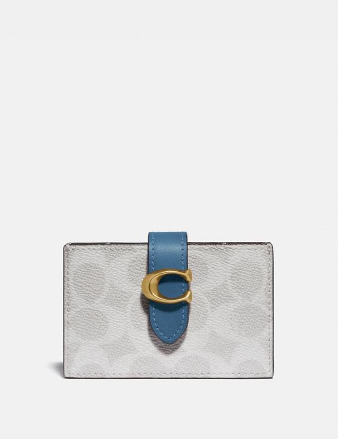 Tarjetero de acordeón en lona con bloques de color de Coach (precio: 94,50€)