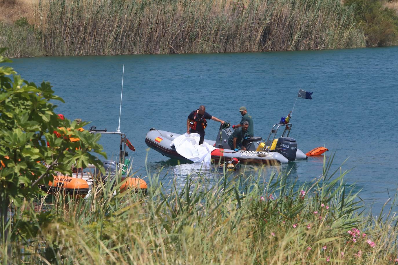 El hallazgo del cuerpo del joven desaparecido en el Lago Azul de Córdoba, en imágenes