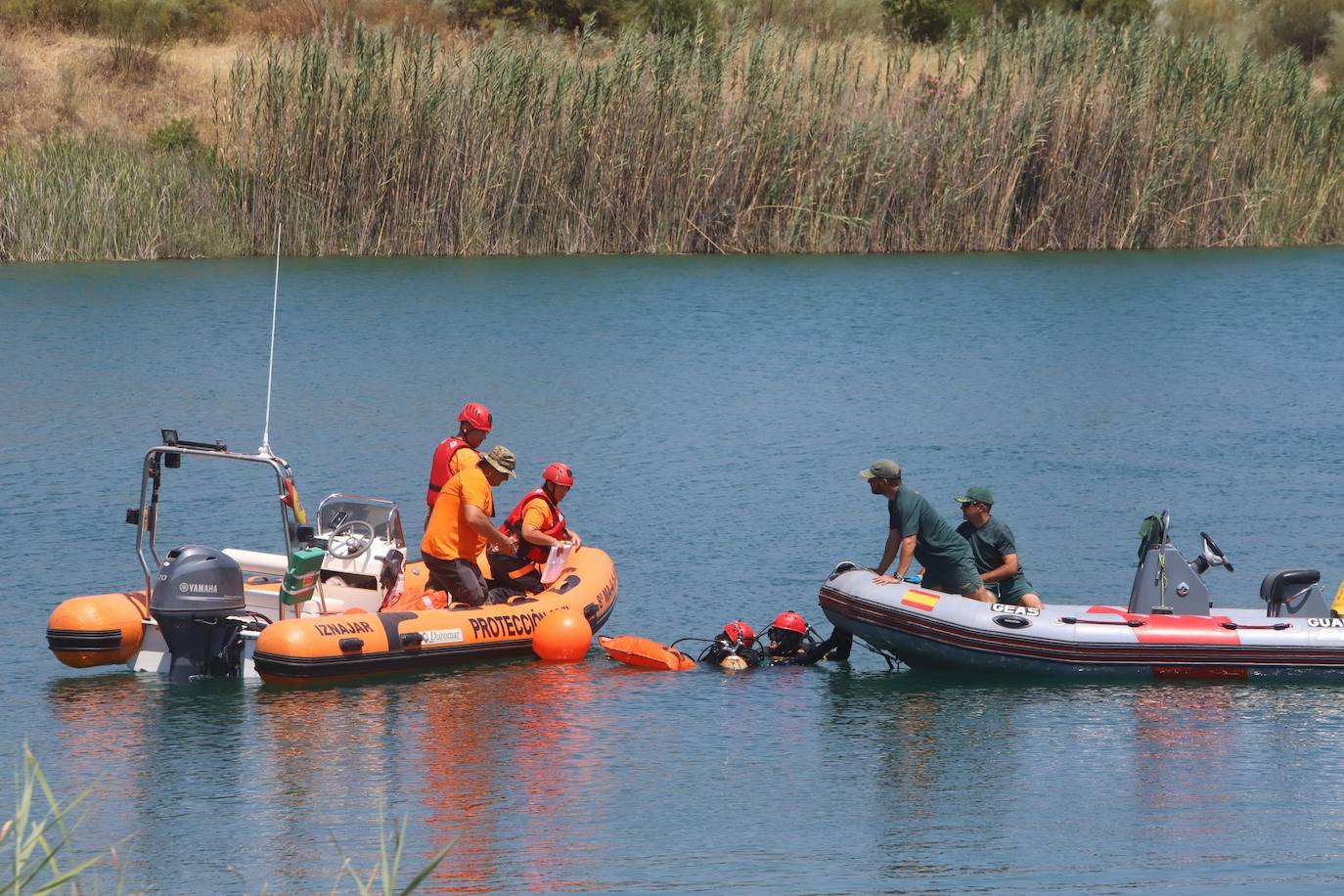 El hallazgo del cuerpo del joven desaparecido en el Lago Azul de Córdoba, en imágenes