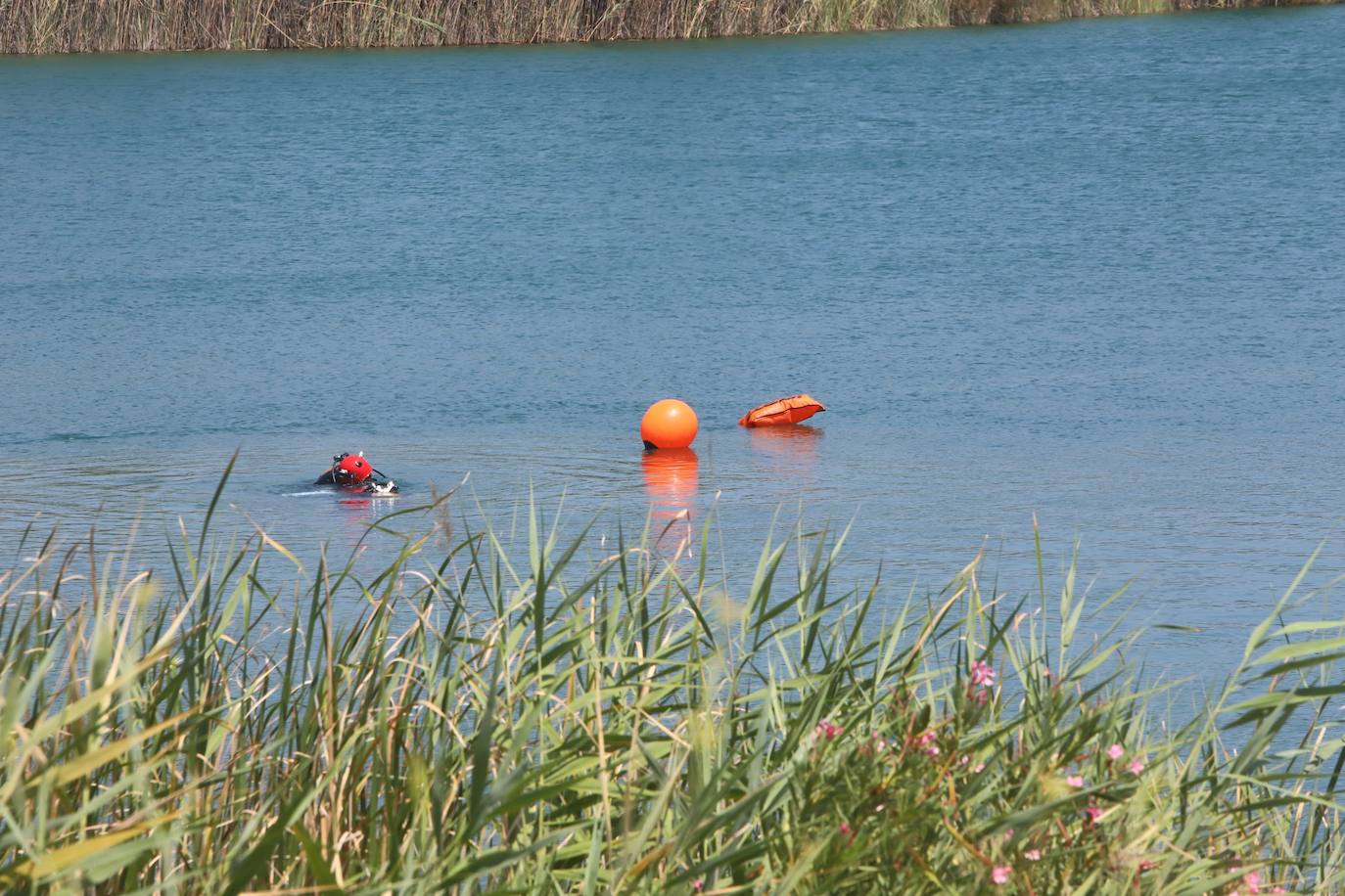 El hallazgo del cuerpo del joven desaparecido en el Lago Azul de Córdoba, en imágenes