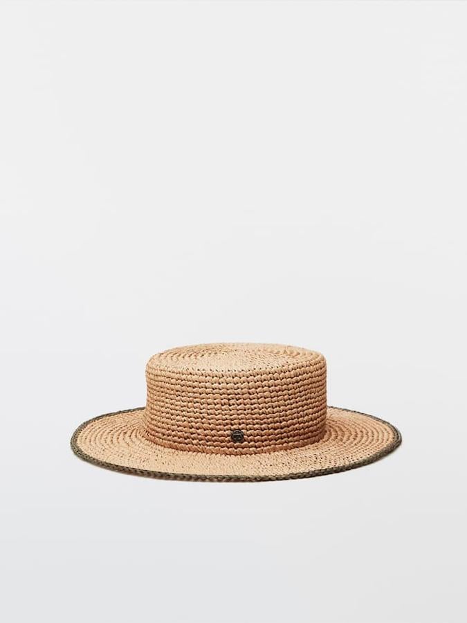 Massimo Dutti - Los accesorios de rafia más sofisticados. Sombrero de rafia con borde bicolor, de Massimo Dutti. Un diseño con reminiscencias vintage que hará las delicias de las más nostálgicas. Precio: 39,95€