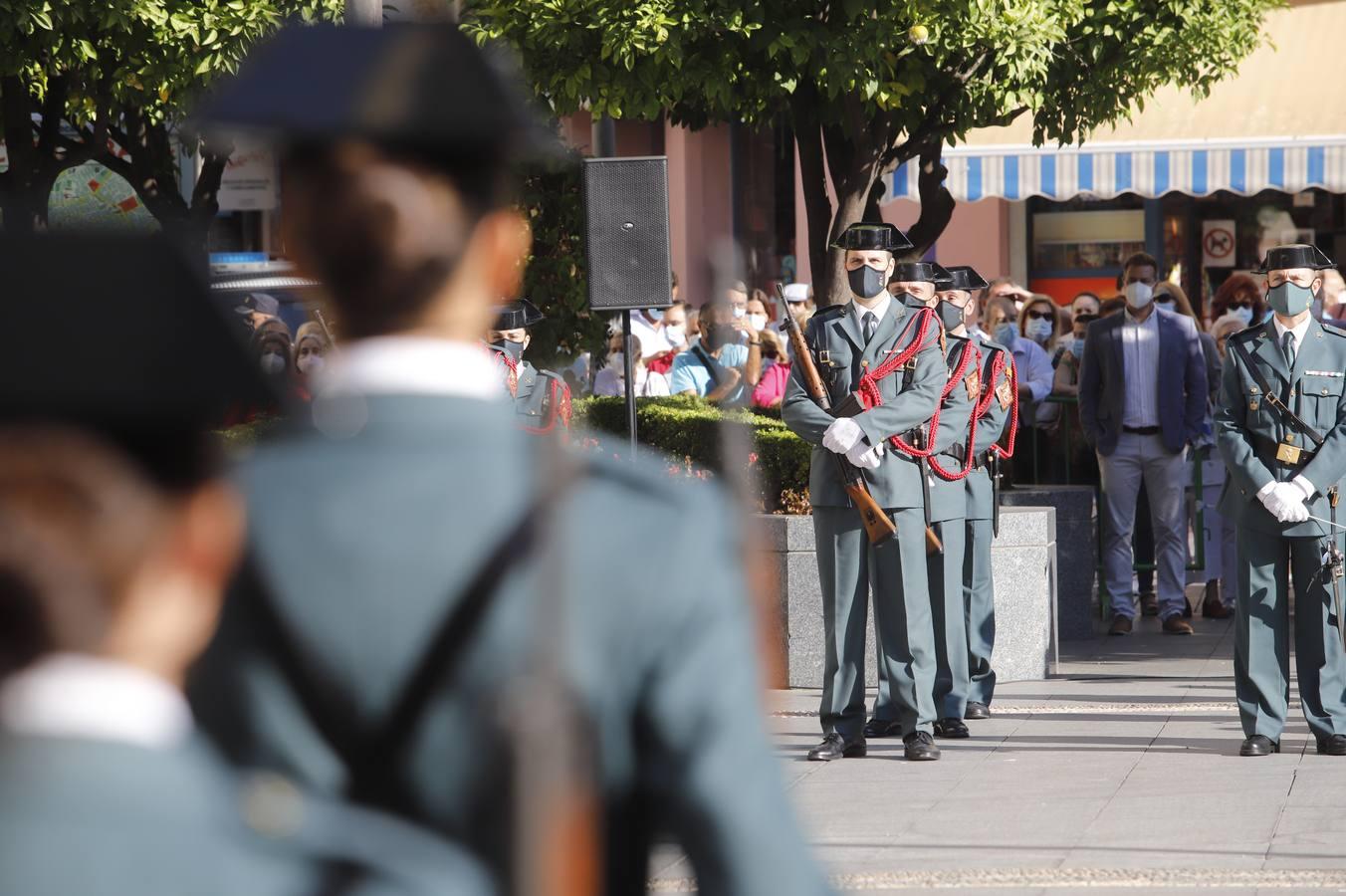 El izado de la bandera de España en los actos de la Guardia Civil por su patrona, en imágenes