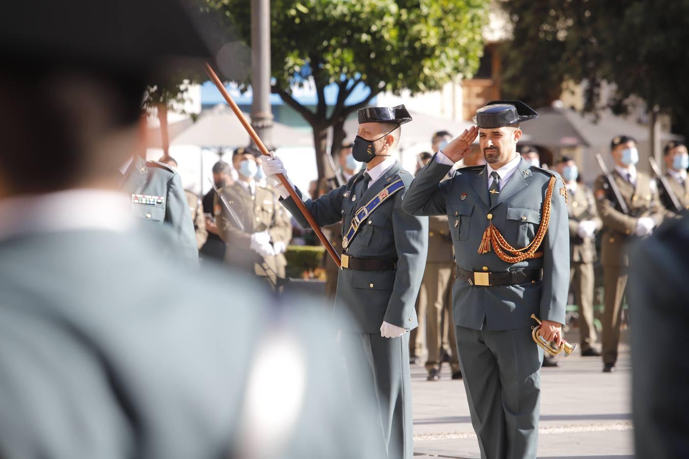 El izado de la bandera de España en los actos de la Guardia Civil por su patrona, en imágenes