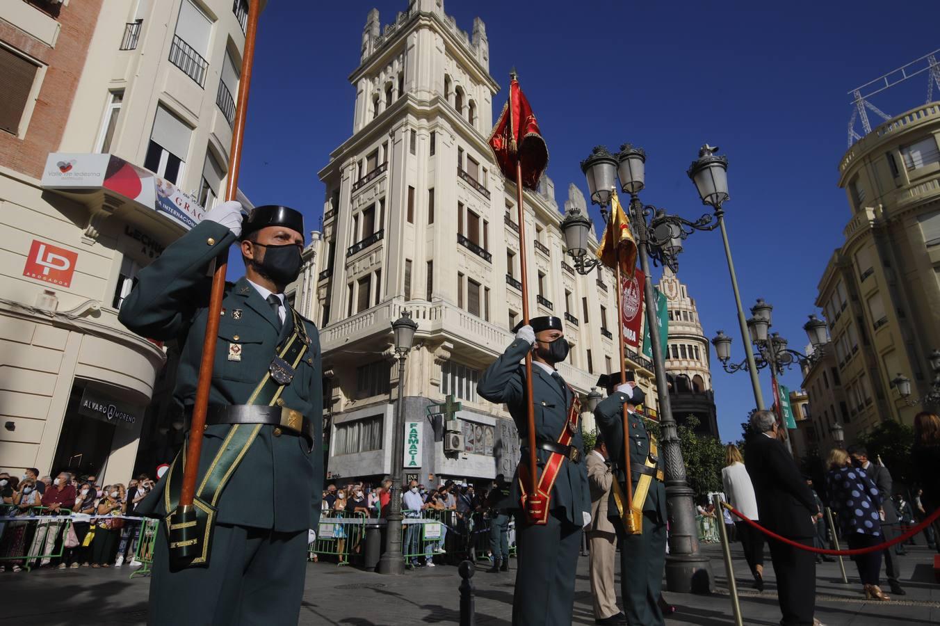 El izado de la bandera de España en los actos de la Guardia Civil por su patrona, en imágenes