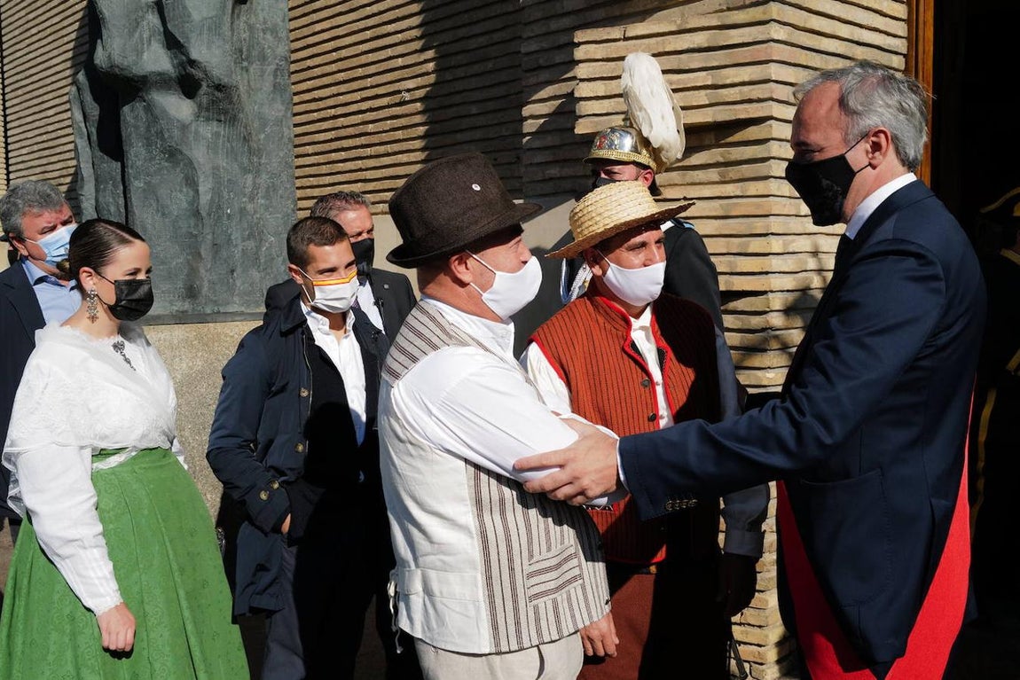 En imágenes: así ha sido la ofrenda floral a la Virgen del Pilar en Zaragoza