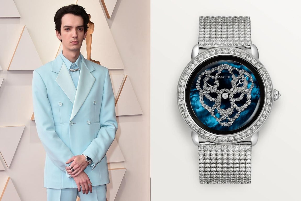 Kodi Smit-McPhee y Cartier. El actor escogió un exclusivo reloj de Cartier, concretamente el Révélation d’Une Panthère con caja de 37mm, realizado en oro blanco de 18k, con brazalete metálico con 44 diamantes talla brillante engastados y sofisticada esfera en la que un total de 650 diamantes conforman la cara de una pantera. El precio de este reloj joya parte de los 257.000 euros