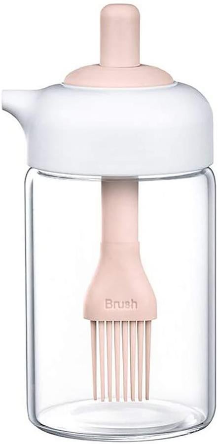 Botella de aceite con cepillo de silicona. Esta botella de aceite con cepillo de silicona es ideal para guardar el aceite. Hay que presionar la parte superior para ajustar la salida de aceite; sacar el cepillo de aceite y sumergirlo en el condimento deseado. Es de XiaoShenLu y está en Amazon.