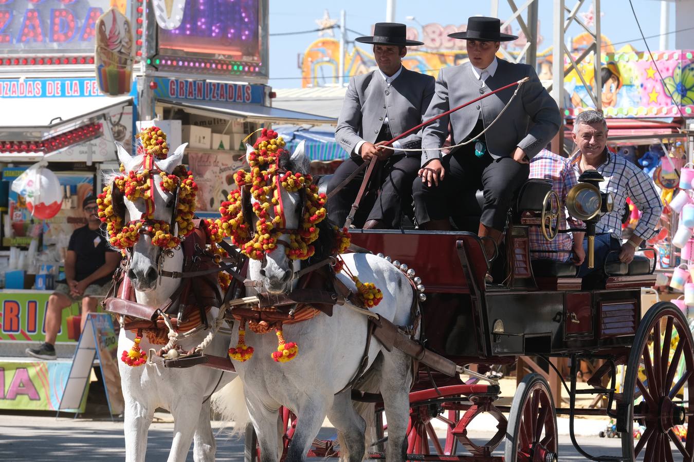 Fotos: Viento y calor en la primera jornada de la Feria de El Puerto en Las Banderas