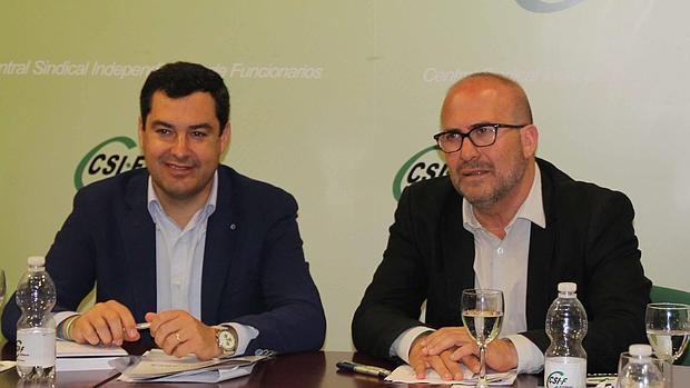 Juanma Moreno, presidente del PP-A, y José Luis Heredia, presidente de CSIF-A
