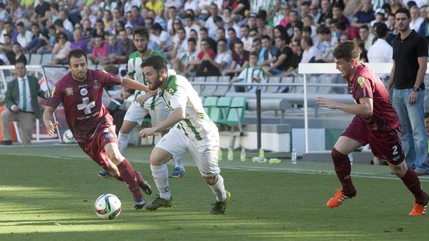 El Córdoba B, ante el Lorca en el partido de ida en El Arcángel