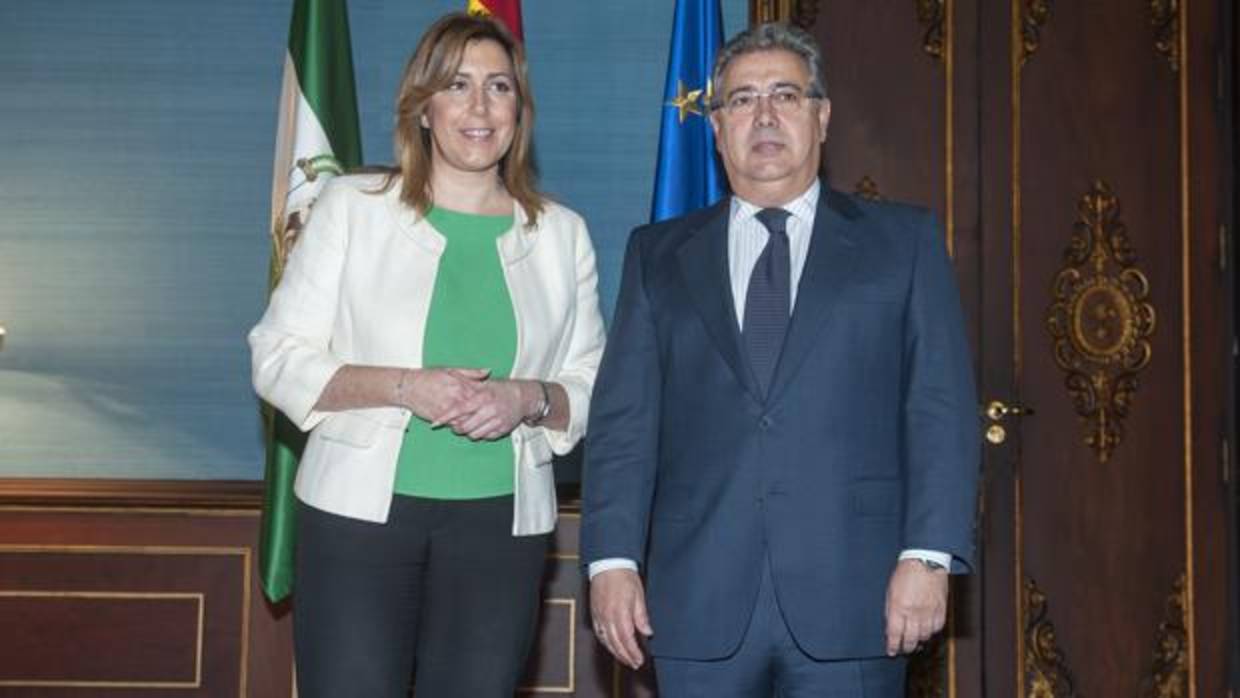 Susana Díaz, presidenta de la Junta de Andalucía, y Juan Ignacio Zoido, ministro del Interior