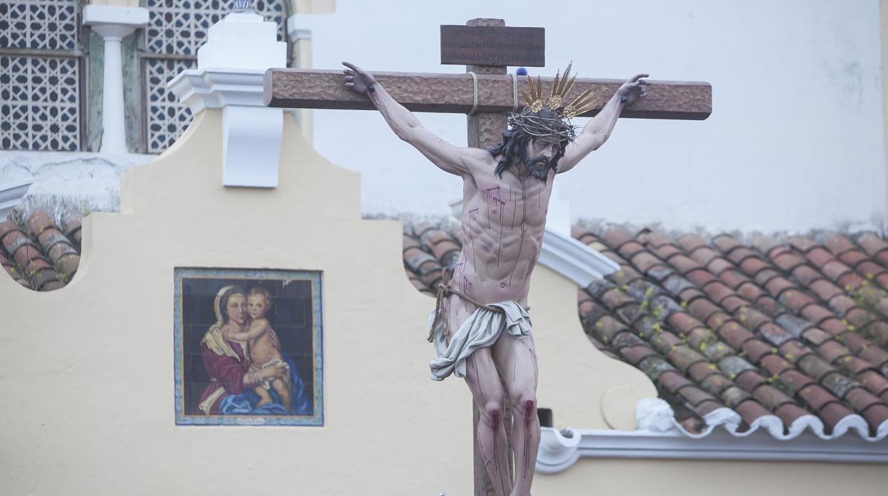 Santísimo Cristo de la Oración y la Caridad durante su salida procesional el Sábado de Pasión