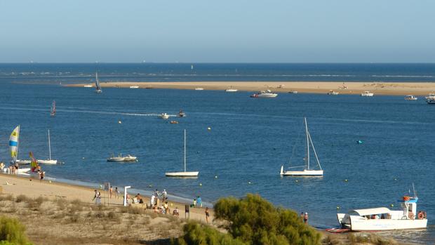 La Flecha de El Rompido de Huelva, referencia para coleccionistas de puestas de sol