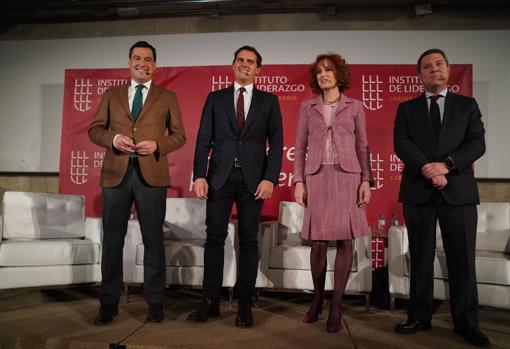 El presidente de la Junta en el acto de Madrid, junto a Rivera, la moderadora y García-Page