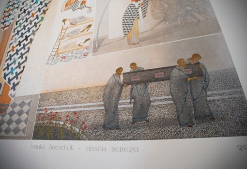 Detalle de la firma del matrimonio ucraniano autor del mural en la iglesia de San Nicolás