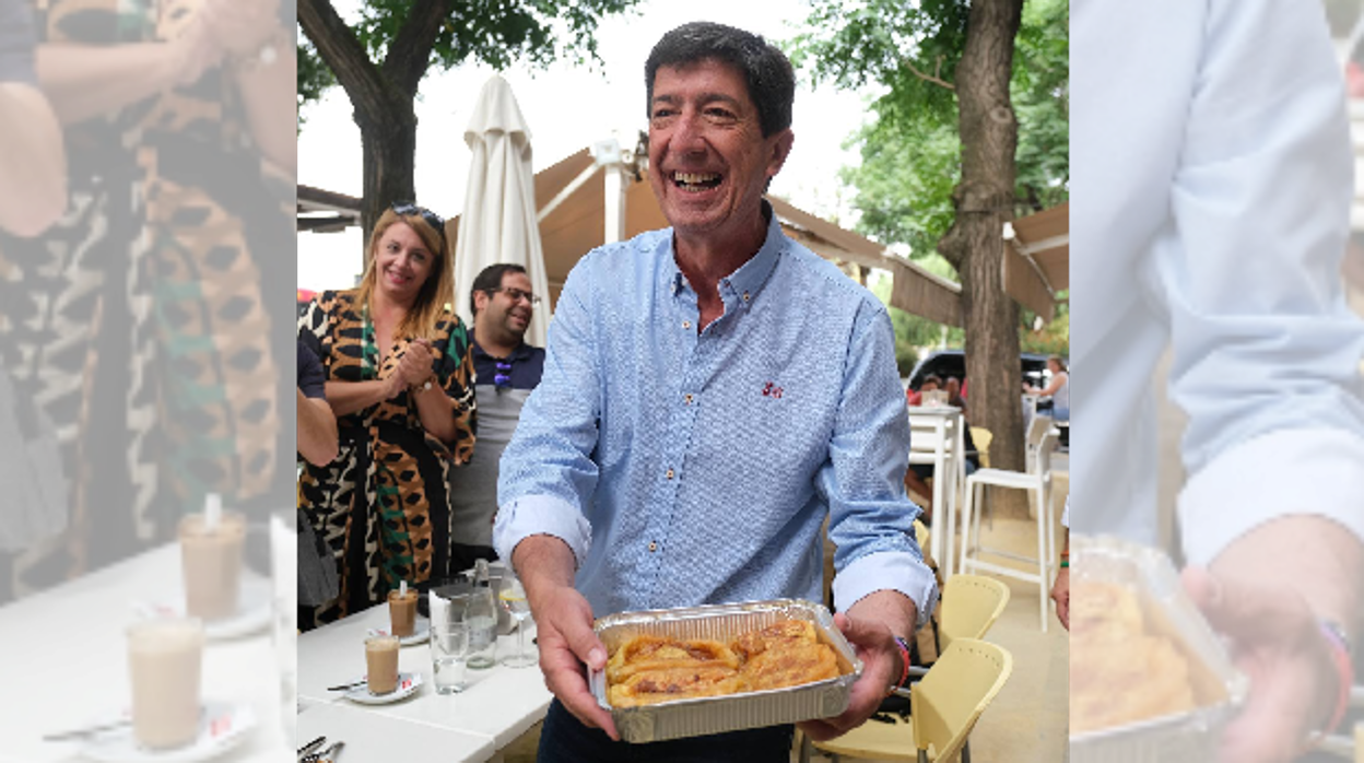 Juan Marín es recibido con una bandeja de torrijas tras el debate electoral del lunes