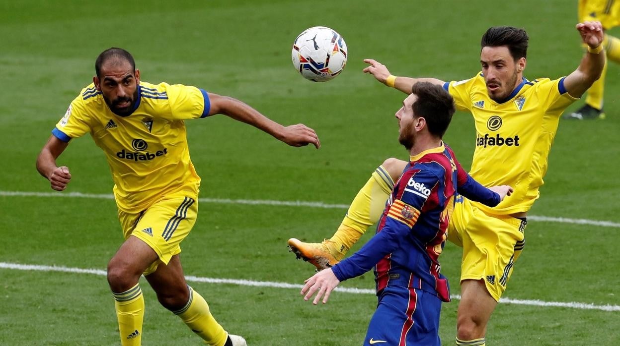 Fali e Iza ante Messi en el Nou Camp.