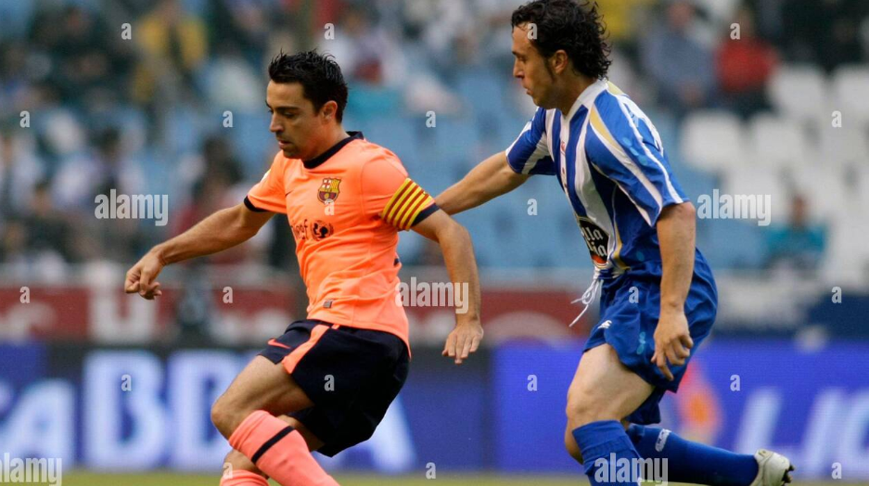 Sergio y Xavi, en un derbi .