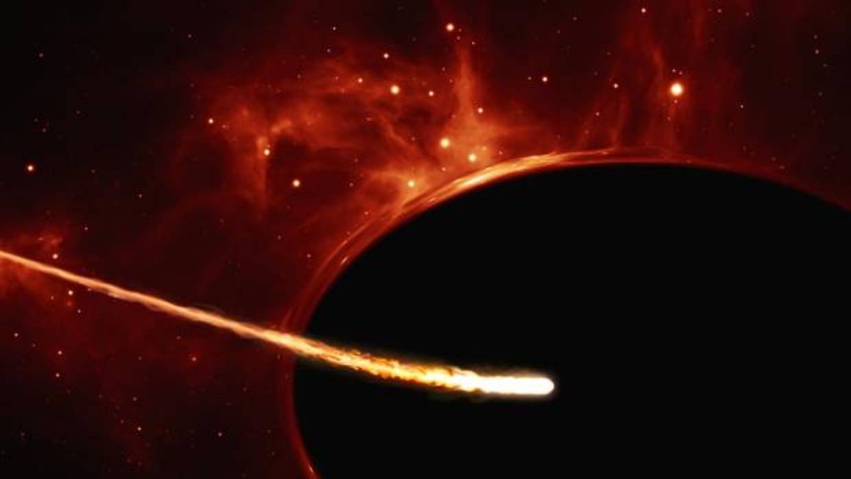 La enorme gravedad de un agujero negro desgarra y estira una estrella como si fuera un espaqueti. Después se traga sus fragmentos, emitiendo fuertes destellos de luz