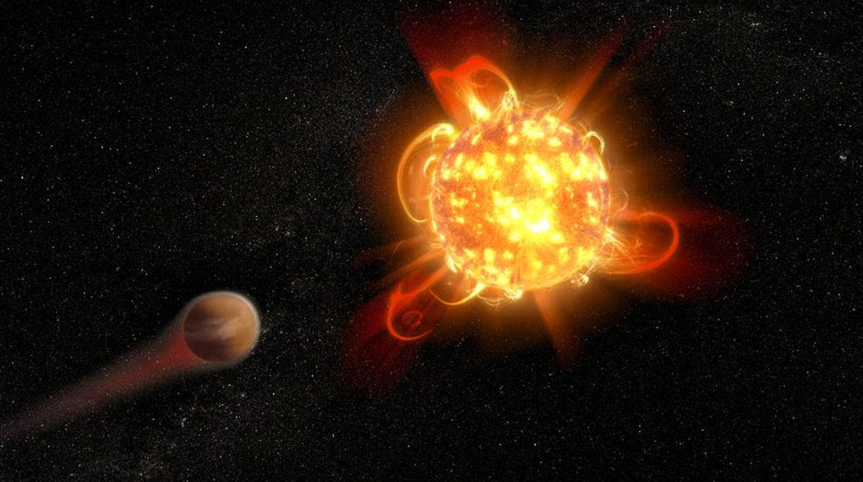 En la representación artística, una enana roja joven y activa (derecha) despoja de su atmósfera de un planeta en órbita (izquierda)