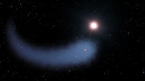 El mundo GJ 436b, con una enorme cola que recuerda a la de un cometa