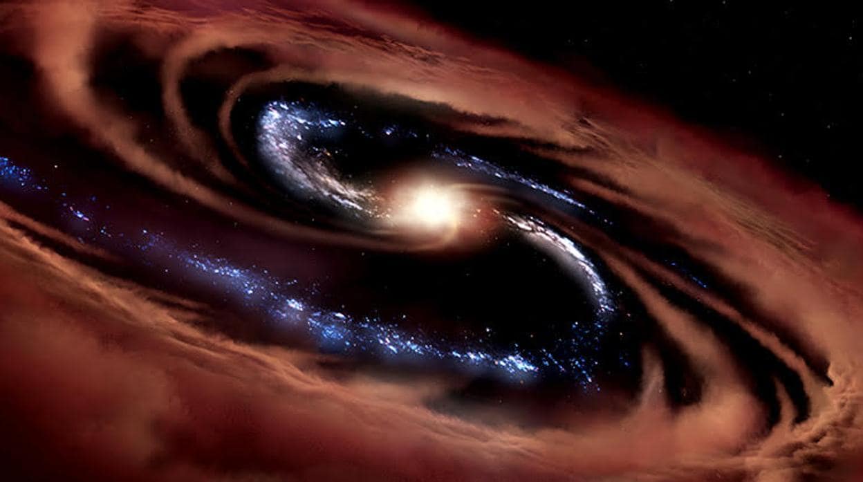 La ilustración muestra la galaxia CQ4479. El agujero negro central está consumiendo tan rápido el material de la galaxia que éste, al girar rápidamente a su alrededor, forma un cuásar muy luminoso. La energía de los cuásares detiene el proceso de formación de estrellas y mata a la galaxia anfitriona