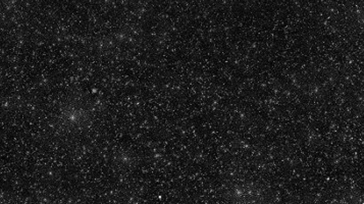 Fragmento del mapa de 25.000 agujeros negros. Cada punto blanco es uno de esos agujeros en el centro de una galaxia