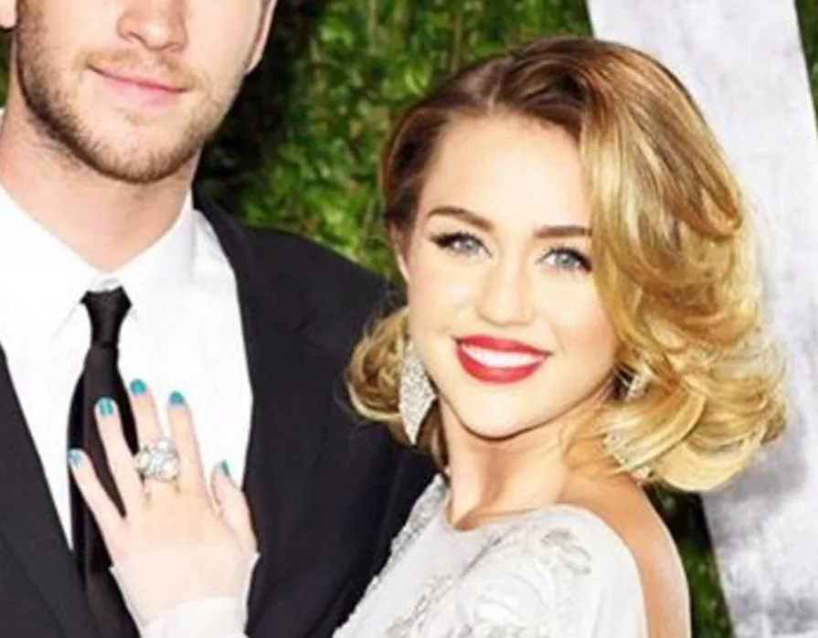 La cantante Miley Cyrus junto a su pareja, Liam Hemsworth