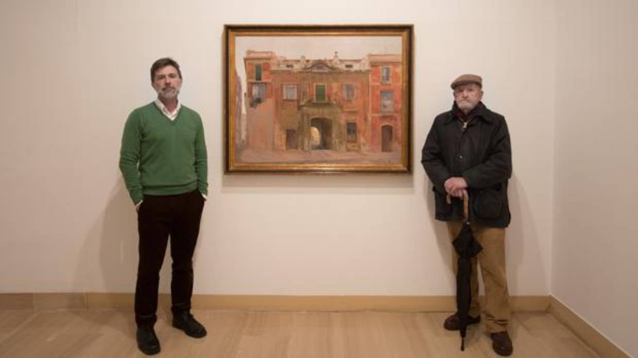 Francisco L. González-Camaño y José Luis Mauri junto a una obra de Joaquín Sáenz