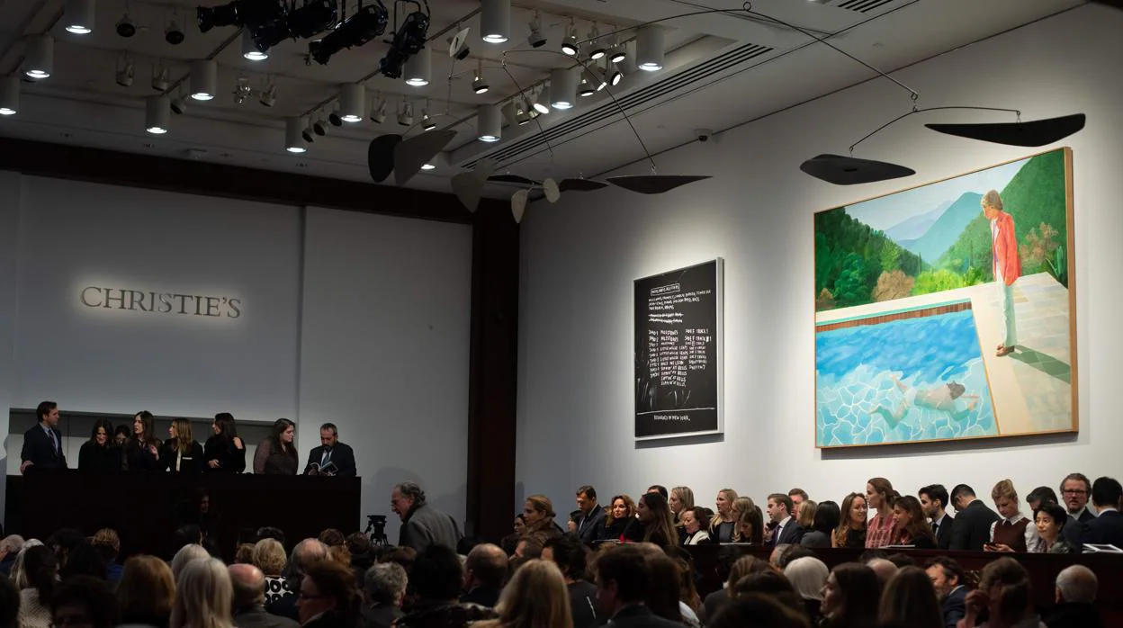 La sala en la que se subastó el Hockney del récord, a la derecha de la imagen