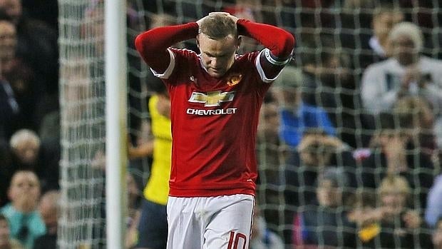 Rooney, con la camiseta roja a la que aludía la Policía